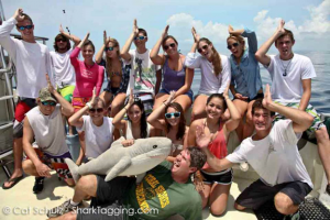 Coral Shores High School poses for a group photo with “Sharkie” for good luck!